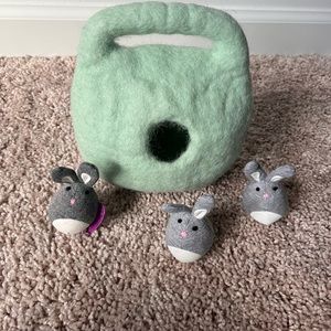 Lovevery Bunnies in a felt burrow